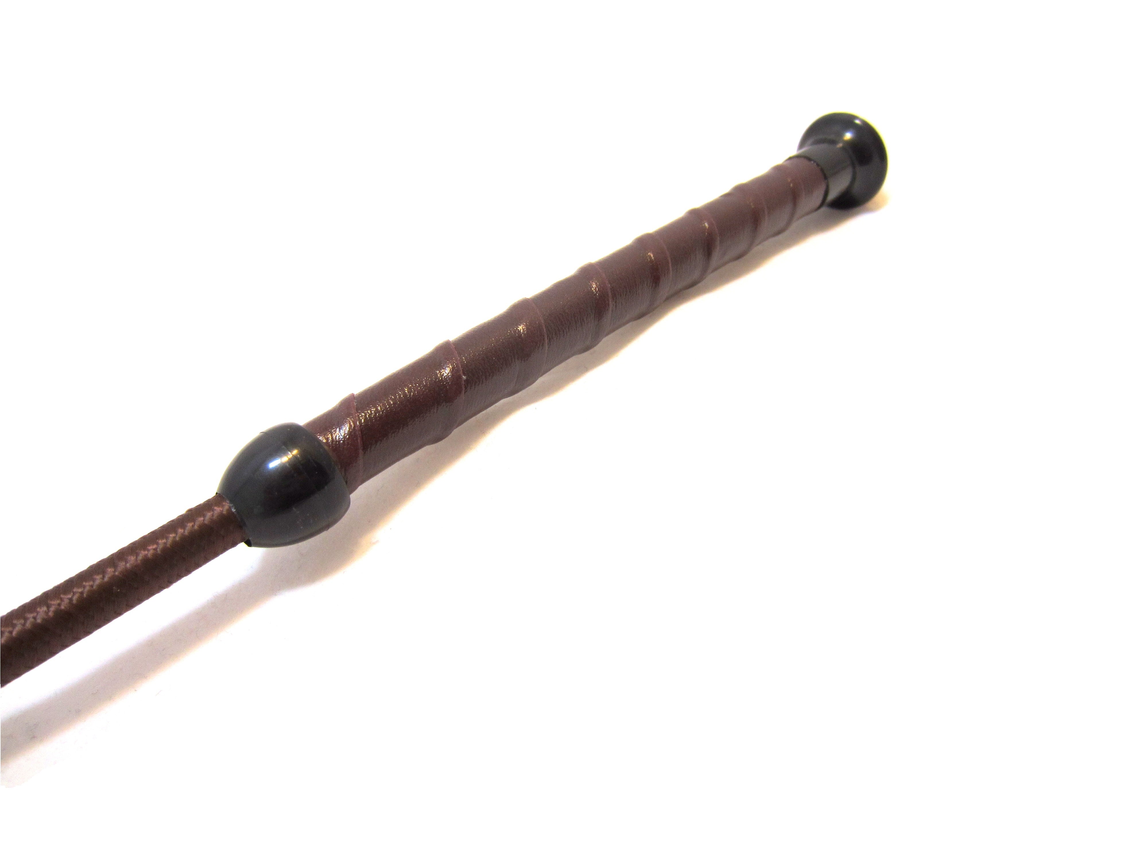 Short riding crop with leather handle, for ridden freedom dressage